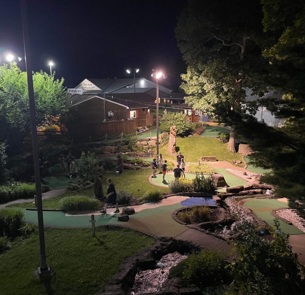 Birds eye view of mini golf at night.